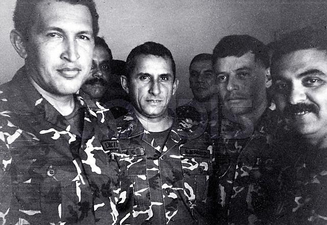 VENEZUELAN PRESIDENT CHAVEZ IS SHOWN IN A 1992 FILE PHOTO IN JAIL WITH FELLOW COUP LEADERS