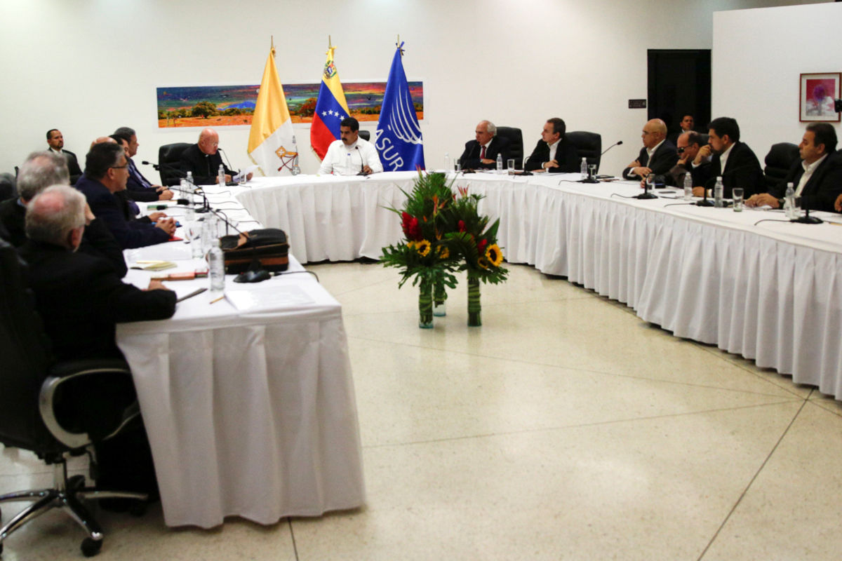 A general view shows a political meeting between government and opposition in Caracas, Venezuela October 30, 2016. REUTERS/Marco Bello